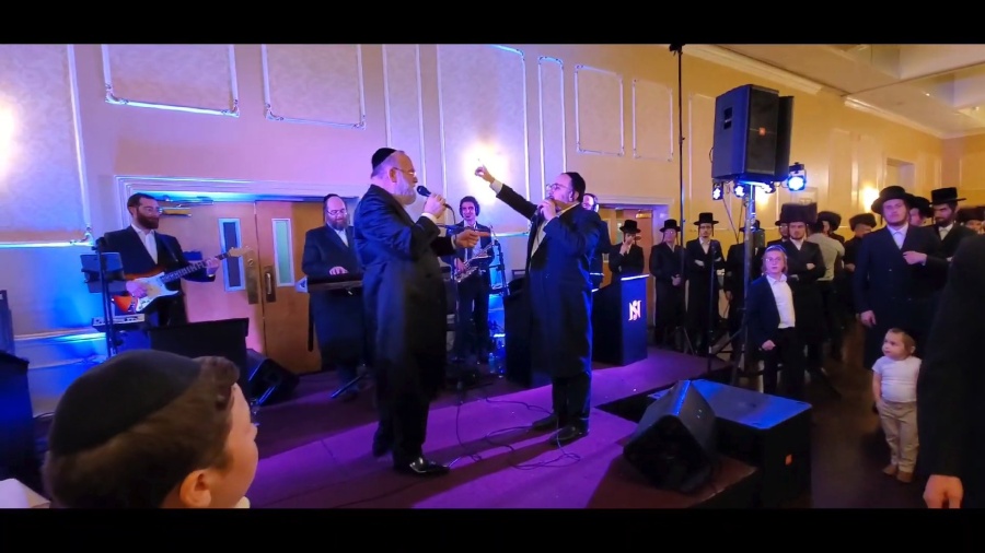 Michoel Schnitzler and Lipa Schmeltzer sing 2nd dance and Bal Shem Tov.