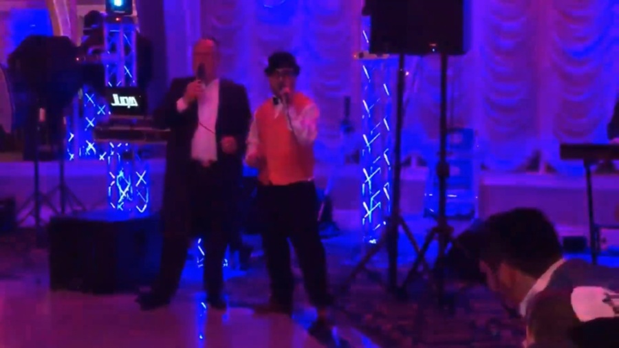 Michoel Schnitzler & lipa schmeltzer singing together at the bar mitzvah of lipa's son!