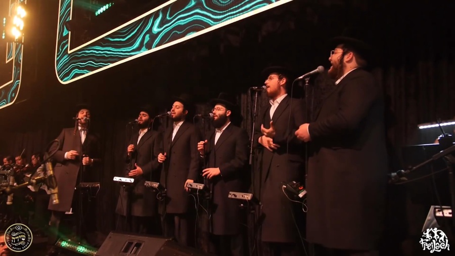 Rega – Freilach Band feat. Mordechai Shapiro & The Shira Choir